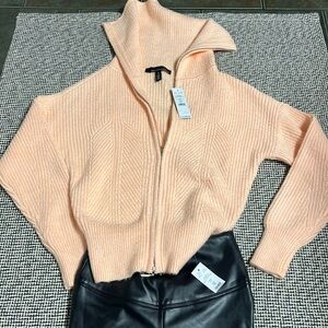 N/W tag White House,Black Market peach colored sweater,Black leather leggings.